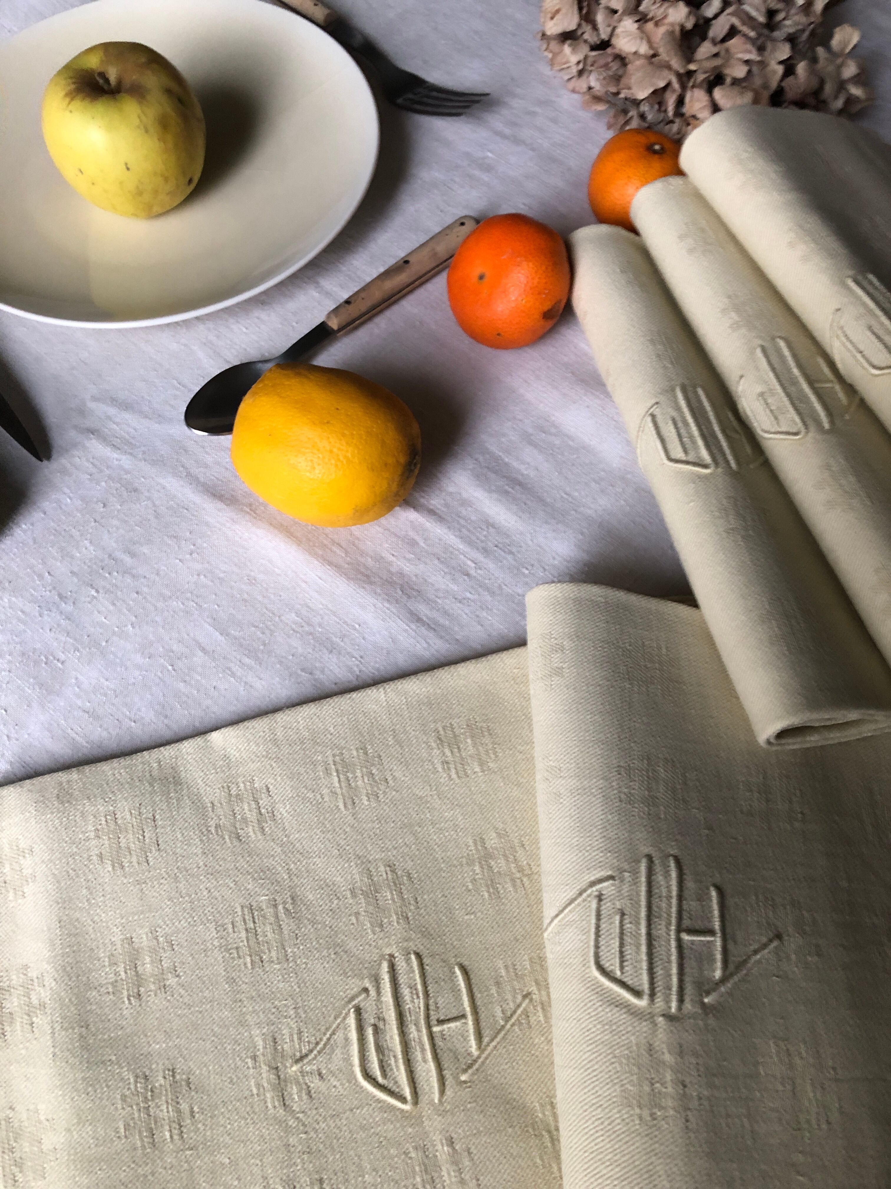 Antique napkins damascus and monogrammed tinted fresh butter