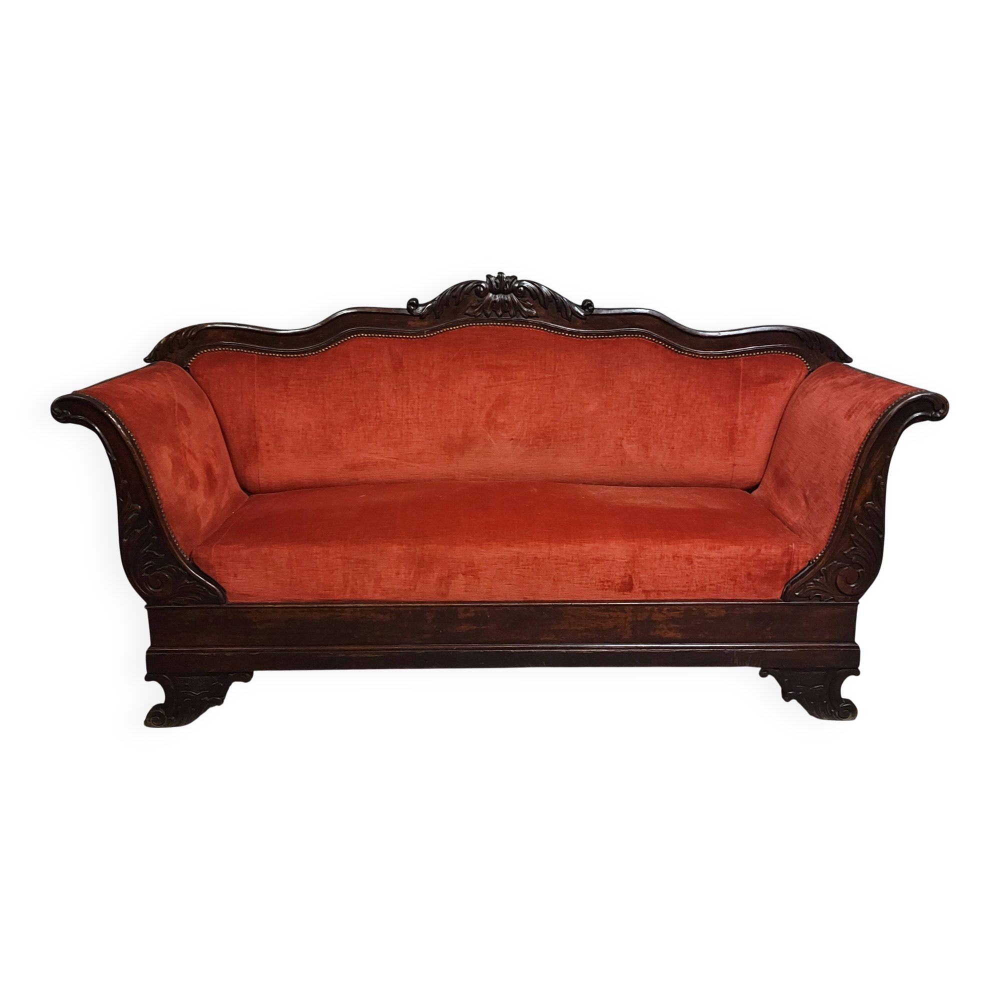 Sleeper or bench from the Charles X period in richly carved mahogany.