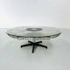 Italian rotating glass and metal coffee table designed for Prada, 1990s.