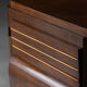 Art Deco walnut sideboard with brass details and sculptural base, France, 1930s