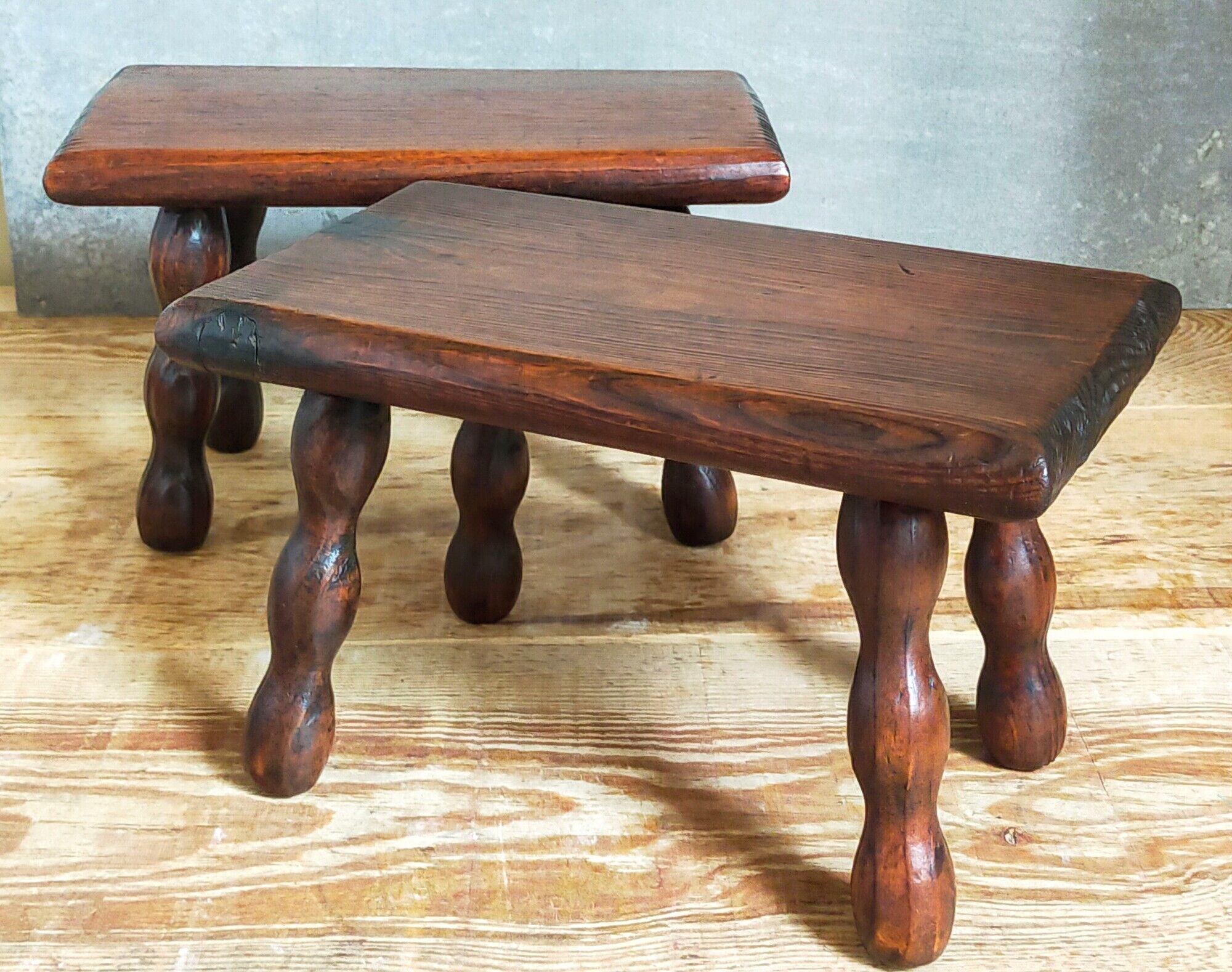 Pair of vintage solid turned wood footstools