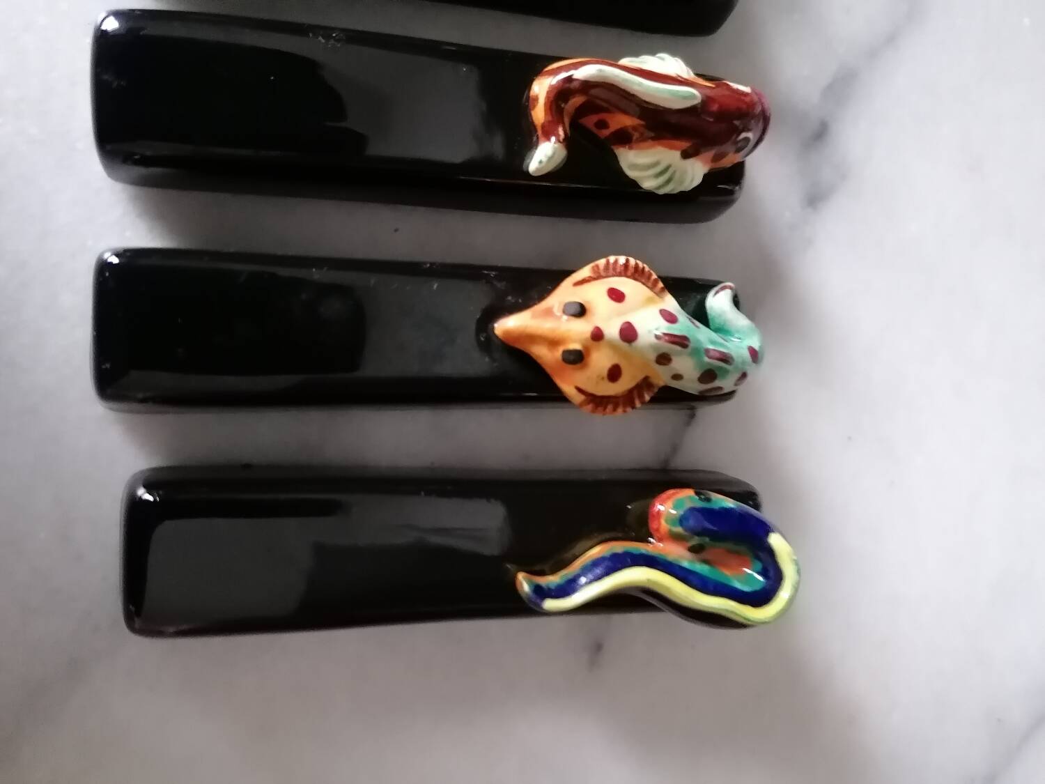Vintage fish slip knife holders