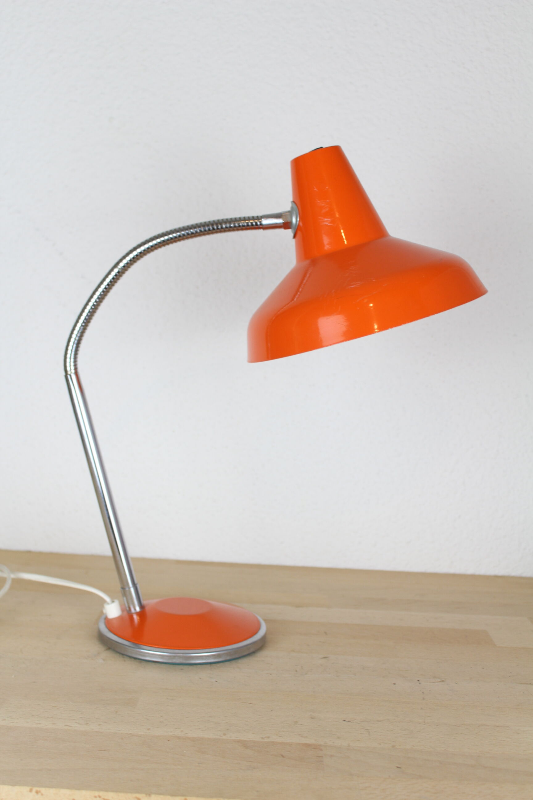 Orange and chrome metal desk lamp
