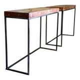 Pair of contemporary consoles in marble and metal.