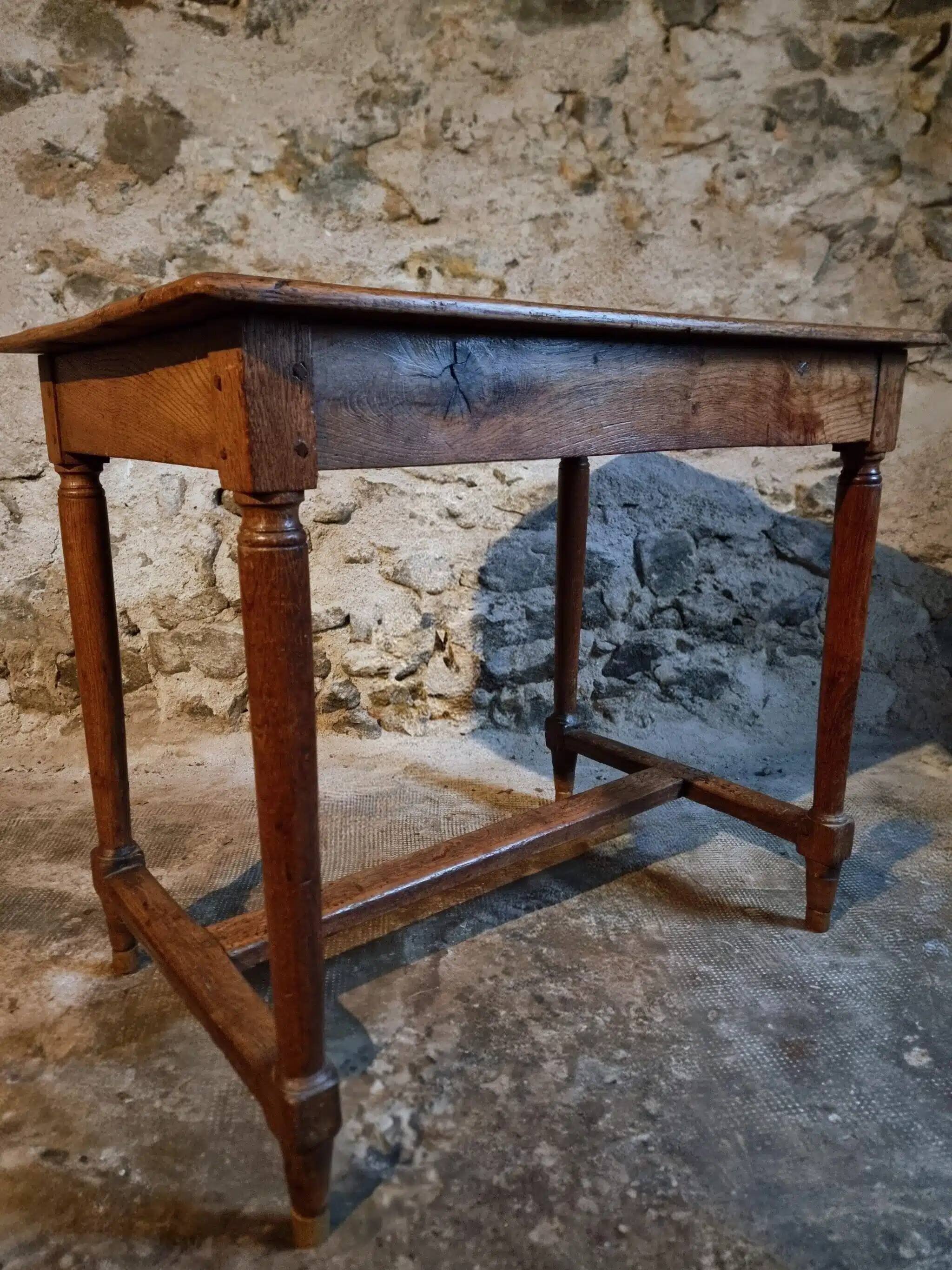 Antique French oak table, writing table from the early 19th century.