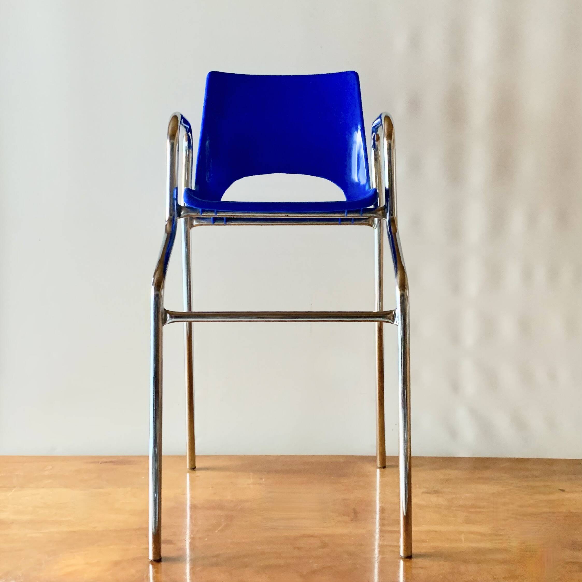 Vintage high chair for children in chrome metal and blue plastic