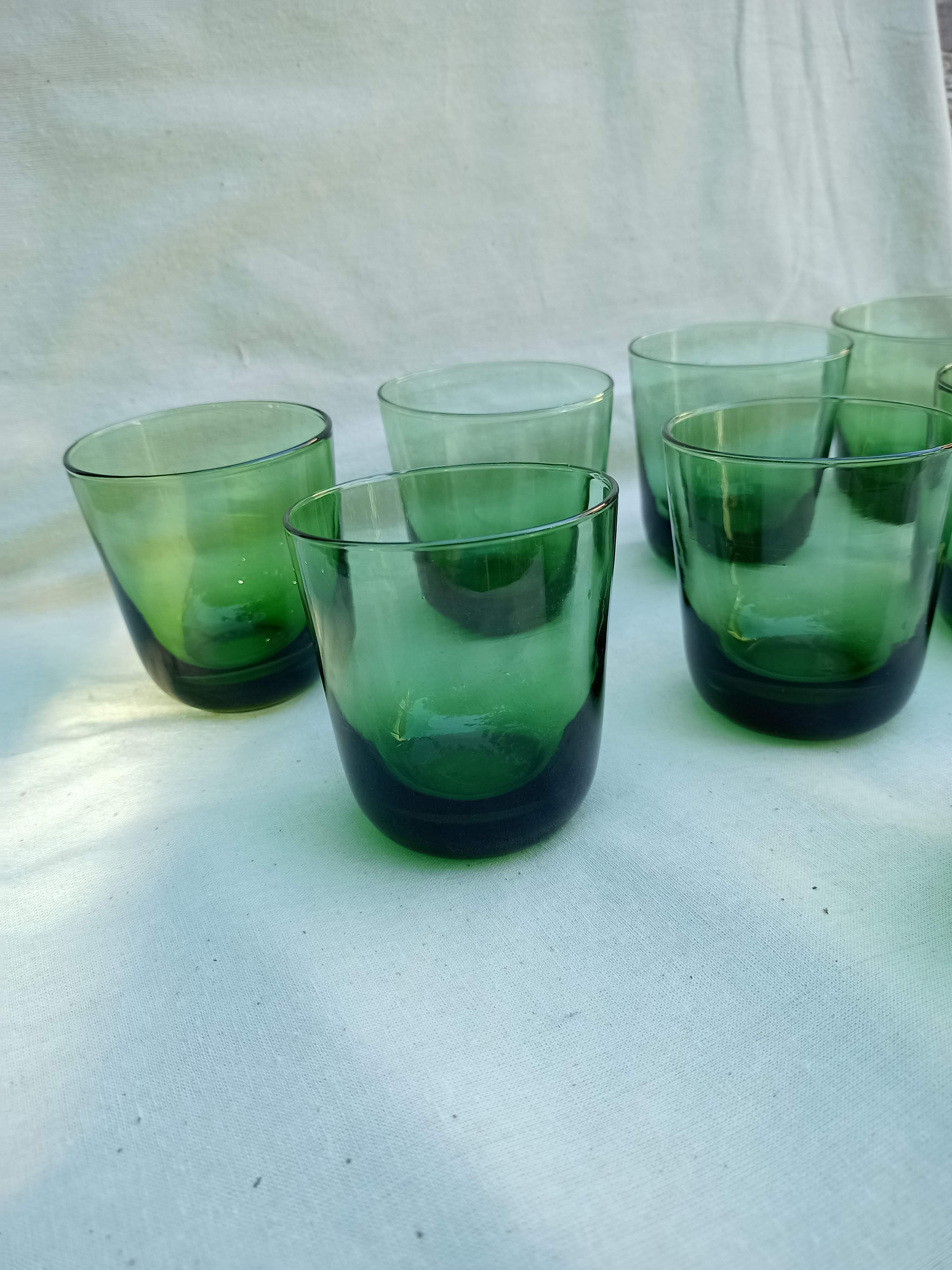 Vintage glasses in slightly bulled green glass