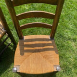 Pair of Georges Robert straw chairs