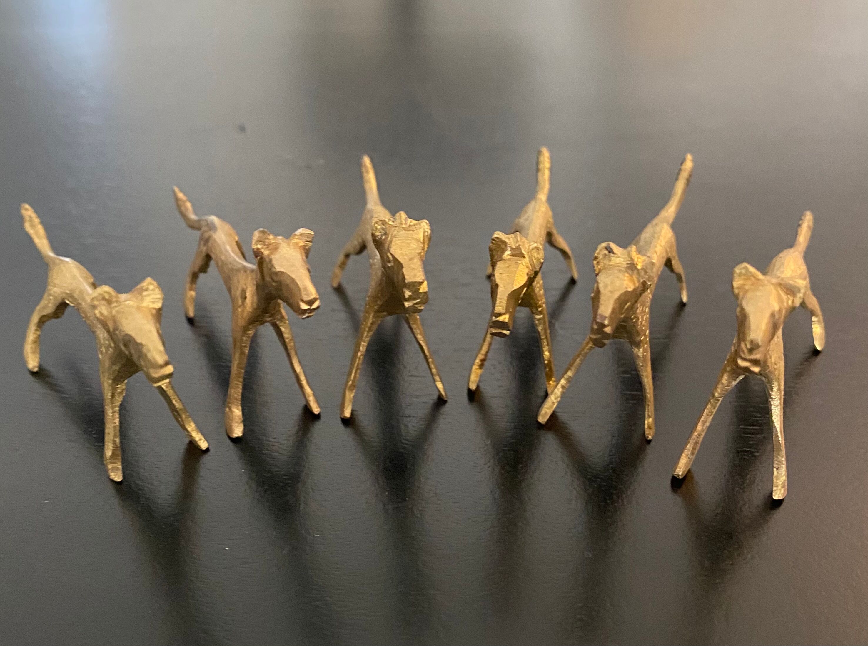 6 lioness-shaped brass knife holders
