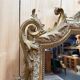 Miroir Napoléon III en bois et stuc doré