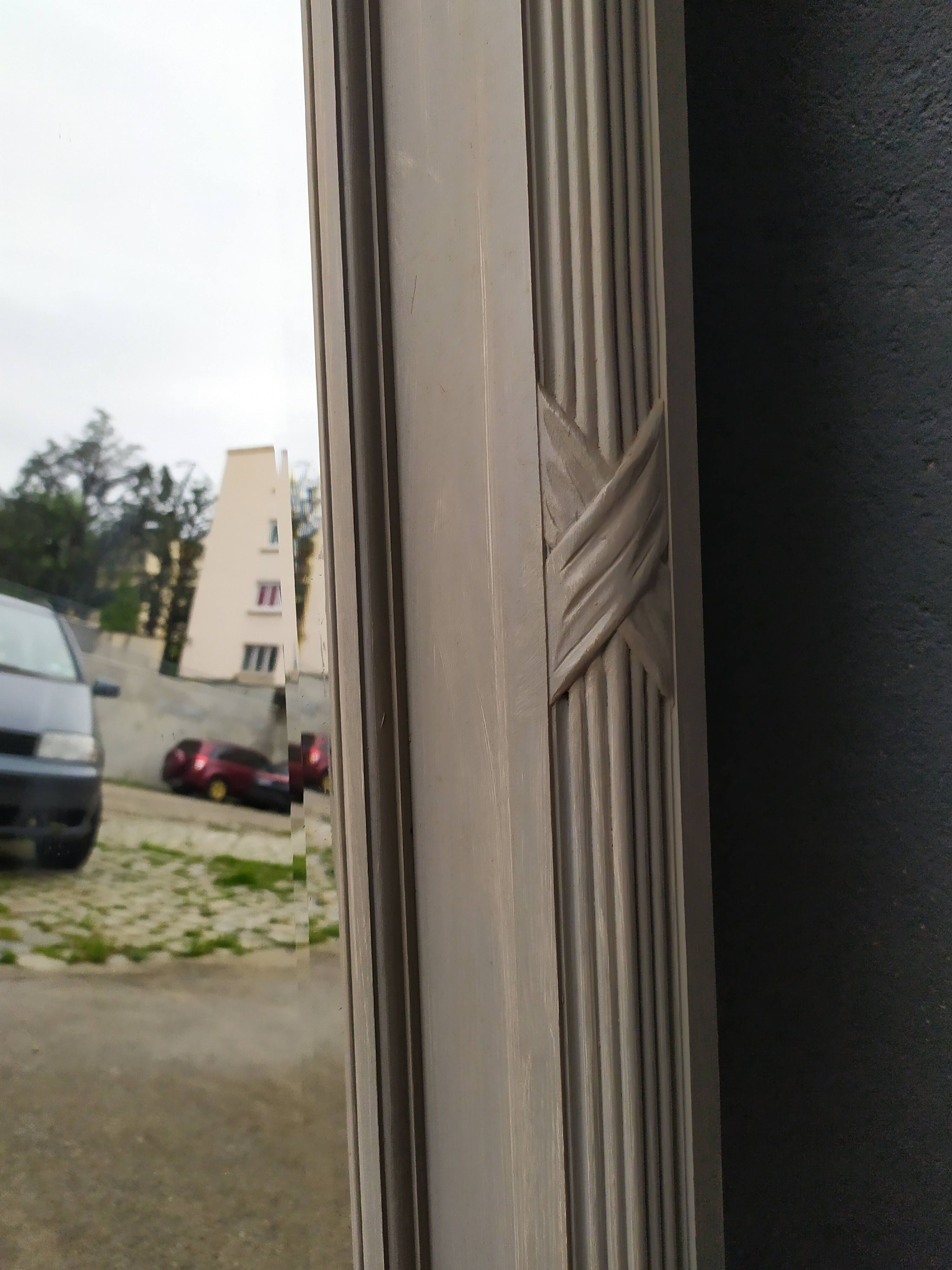 Old grey patinated mirror