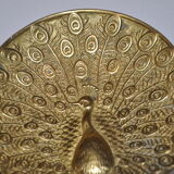 Brass pocket with peacock decoration