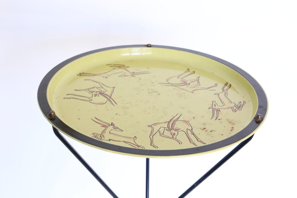 Black and yellow enamelled metal table, vintage, African Antelope motif, 1960