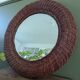 Woven rattan mirror