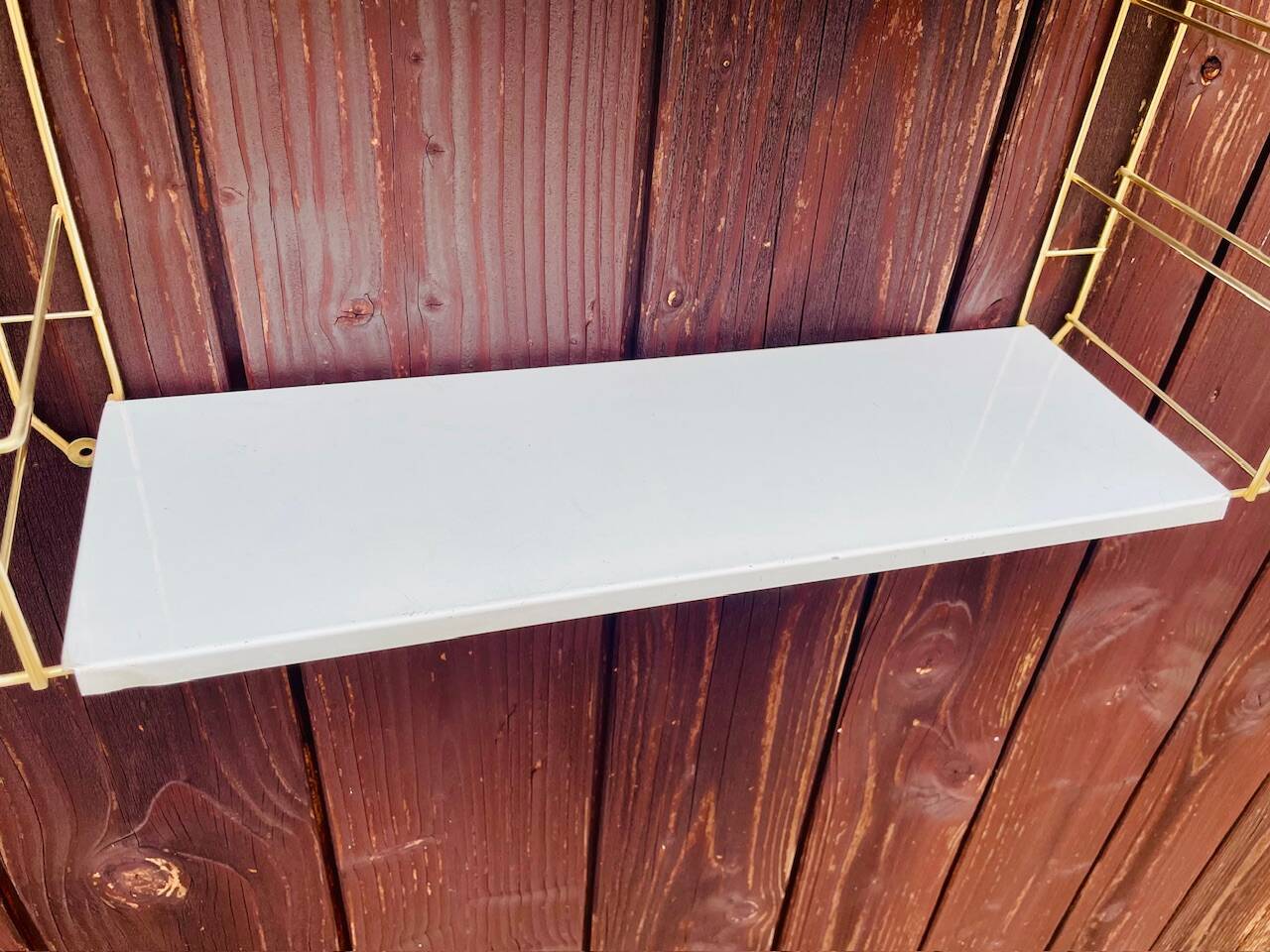 Vintage modular wall shelf, metal and brass, circa 1960s