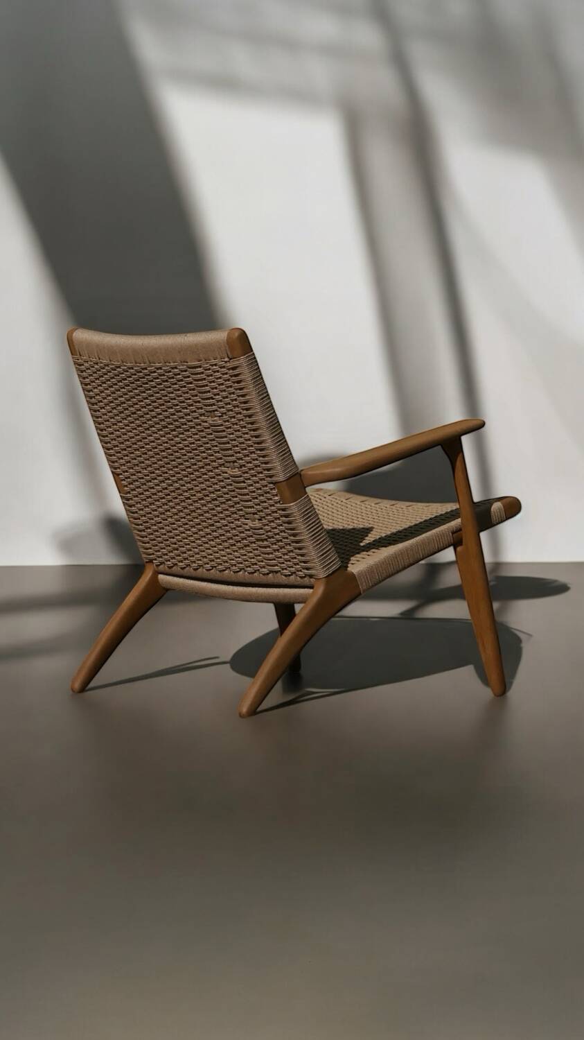 Ch25 easy chair by Hans J. Wegner published by Carl Hansen & Son, 1960