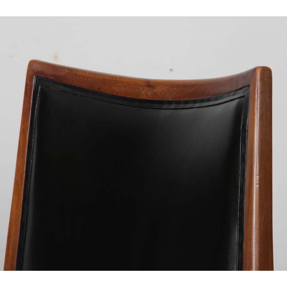 Pair of vintage wooden and leather armchairs from the 1950s.