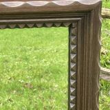 Rustic mirror called brutalist, molded carved natural wood