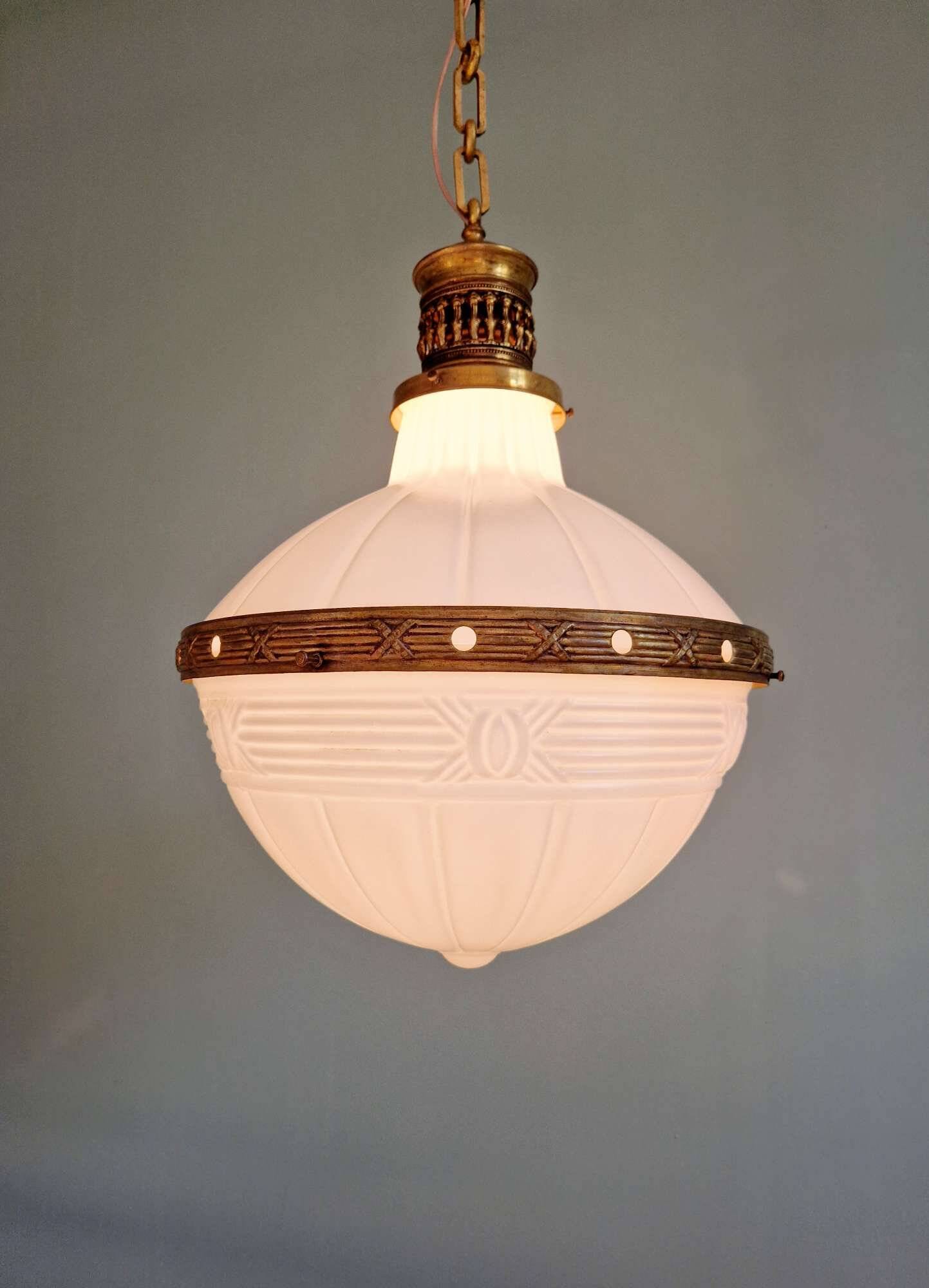 Large Art Deco pendant light in milky glass and brass, 1920