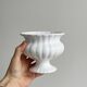 White ribbed porcelain plant pot cover