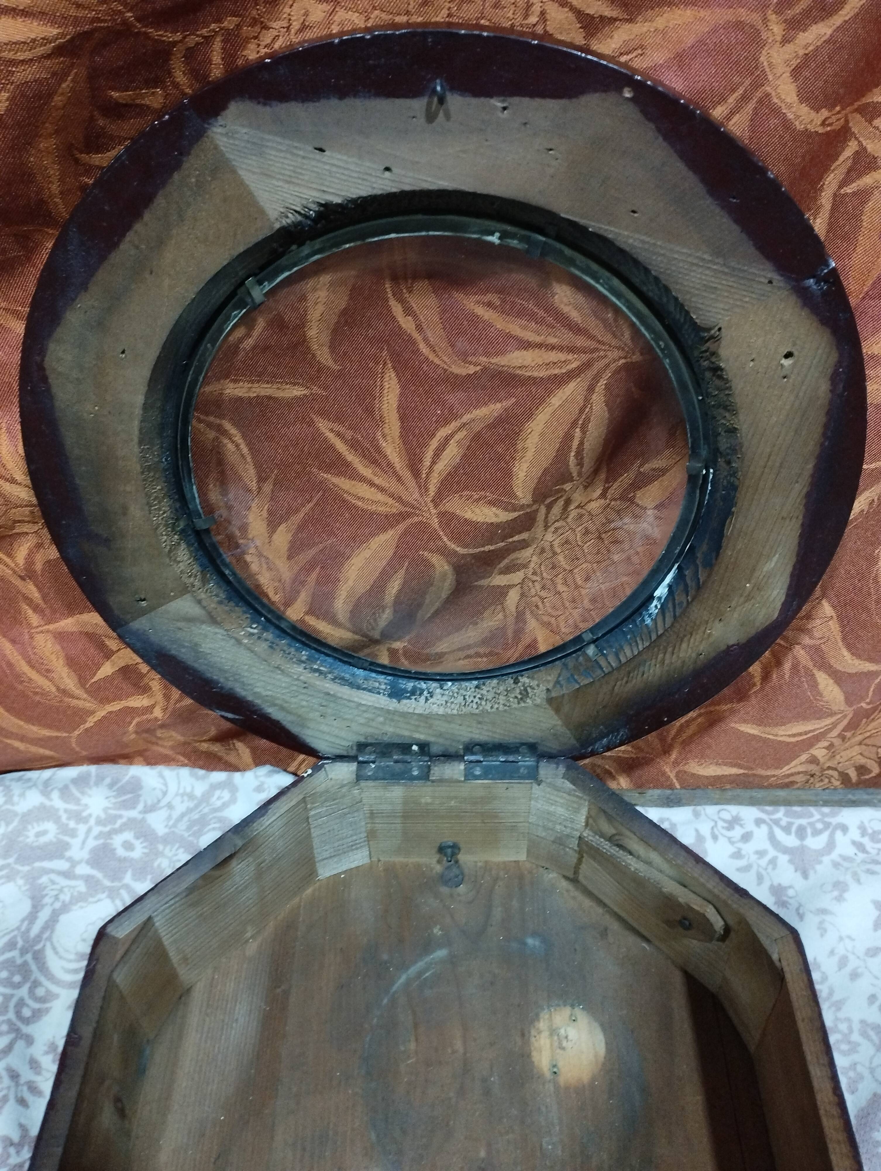 Small round bull's eye wall display case in wood and curved glass