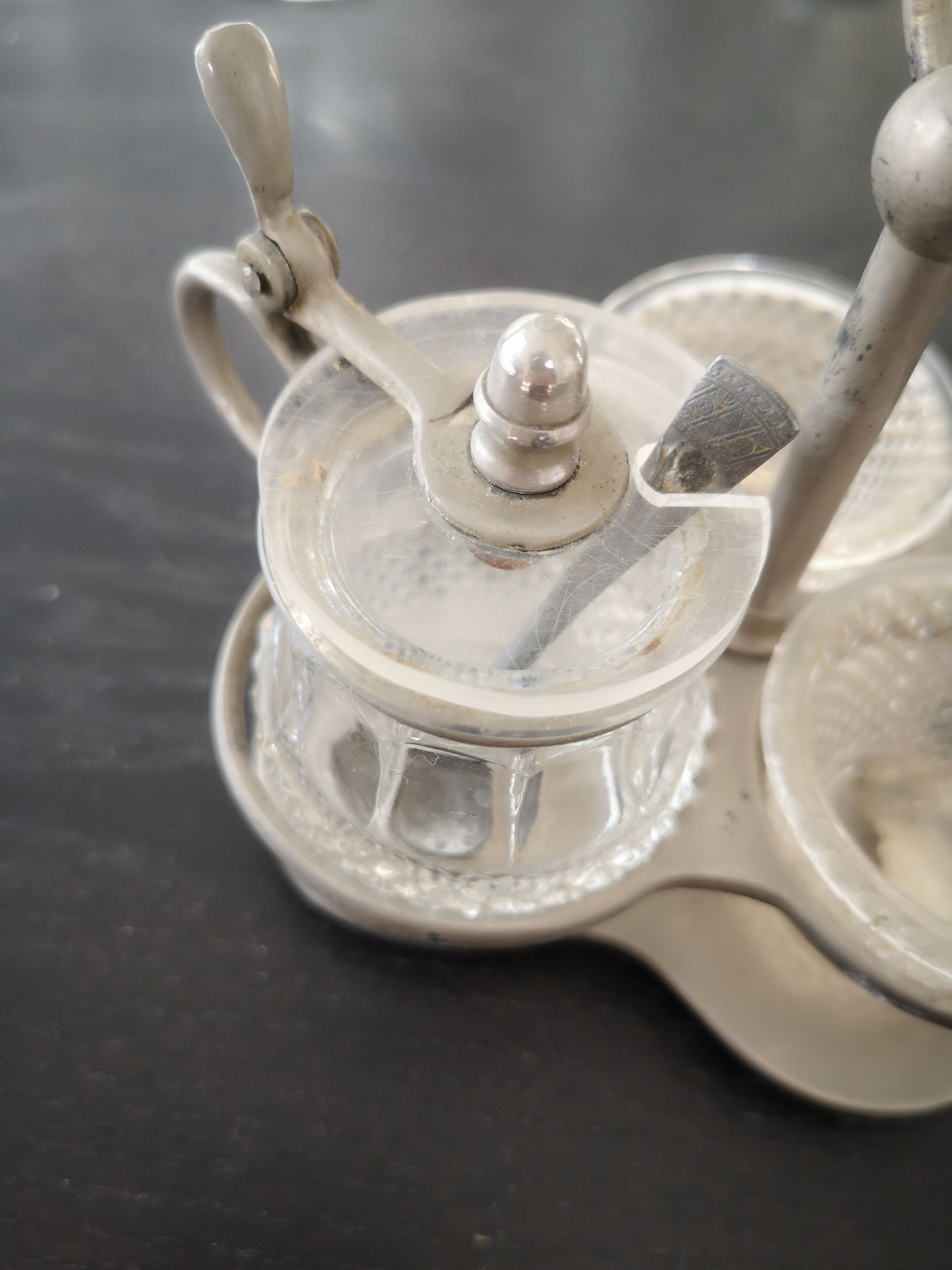 Salt, poivier, mustard with spoons