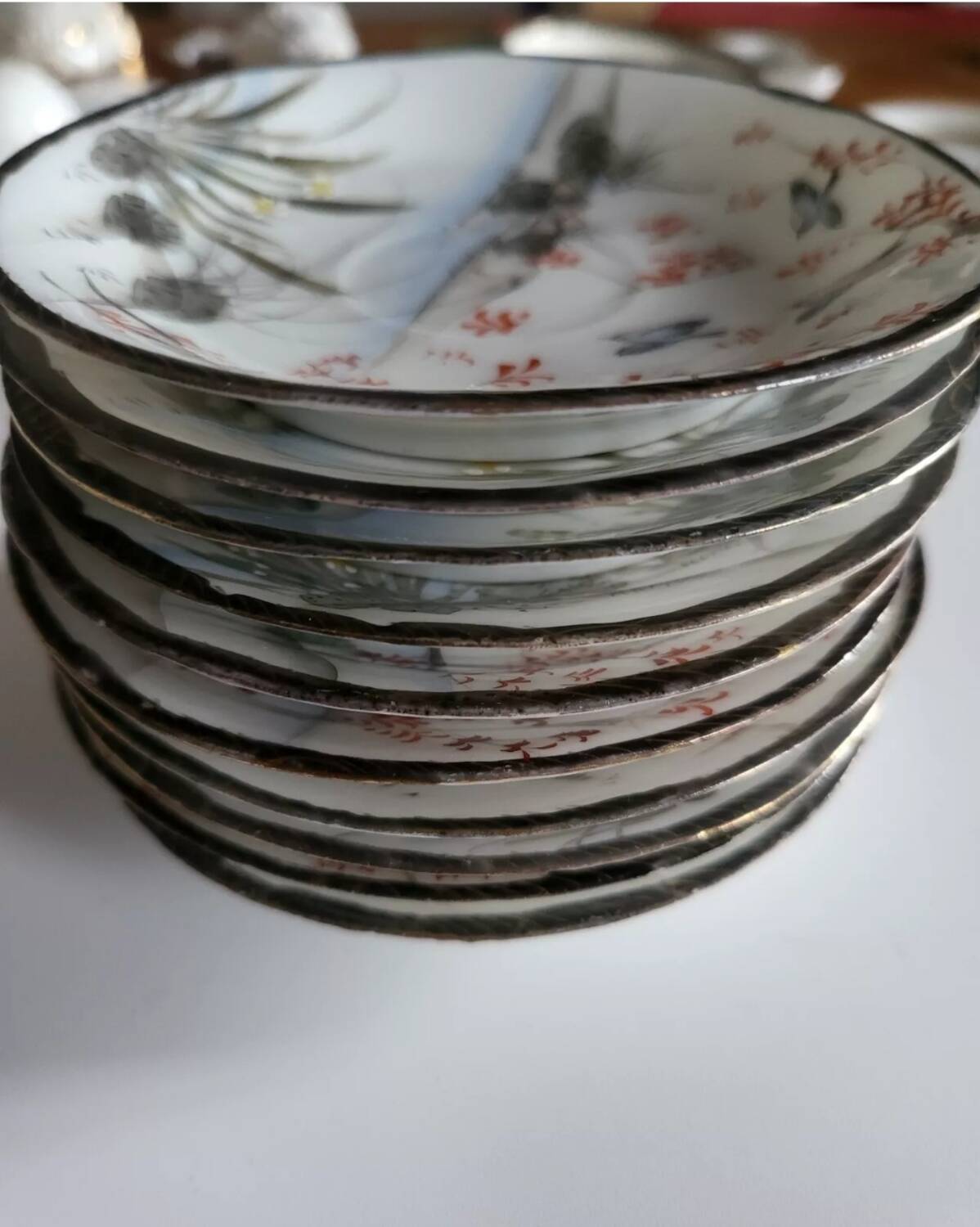 Series of 10 Fine Porcelain Cups and Saucers with Japanese Decor