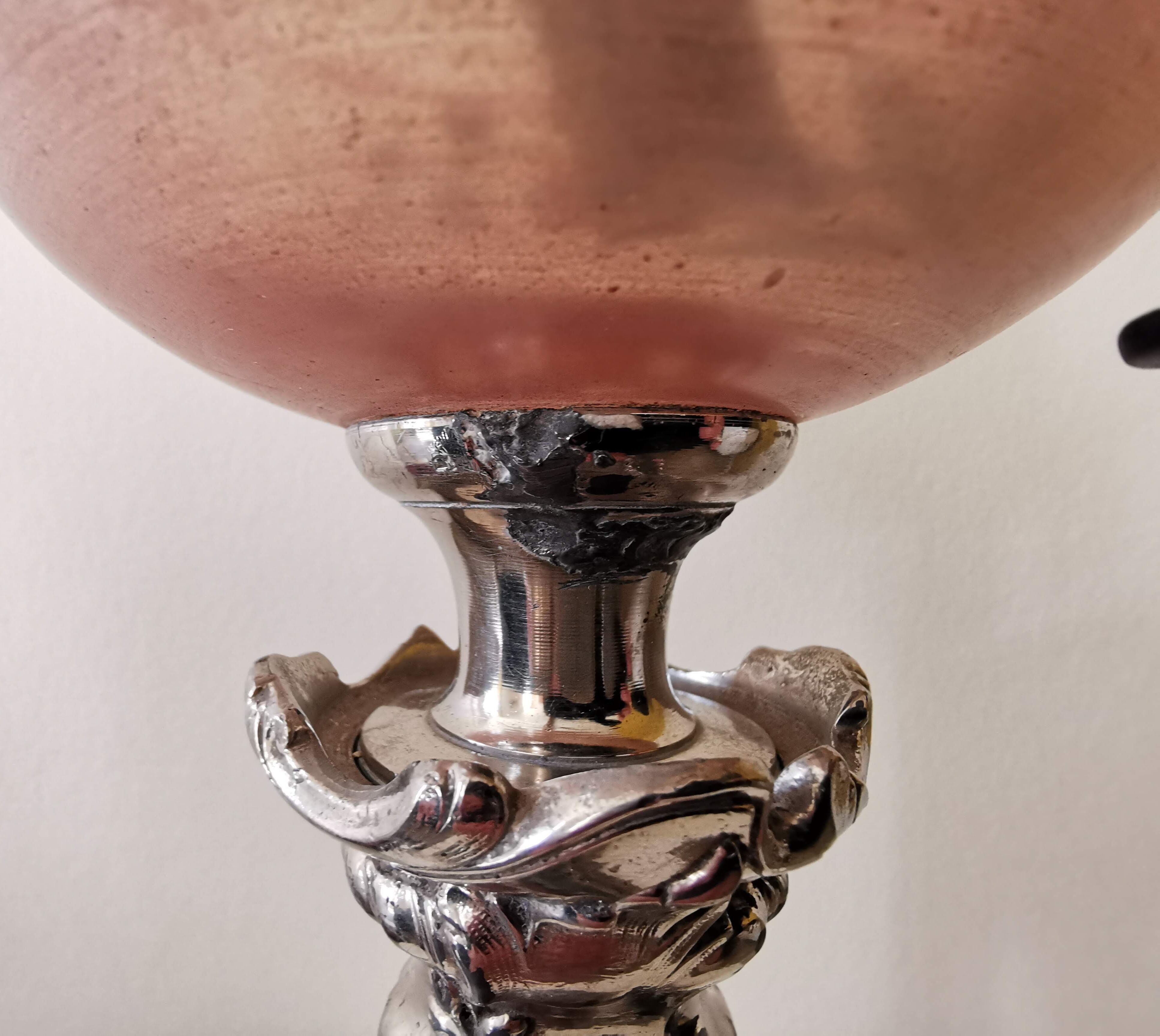 Kerosene lamp late nineteenth century mounted on Corinthian column.