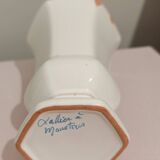 Hexagonal earthenware vase from Moustiers signed