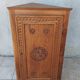 Corner cabinet in carved walnut, Savoyard style.