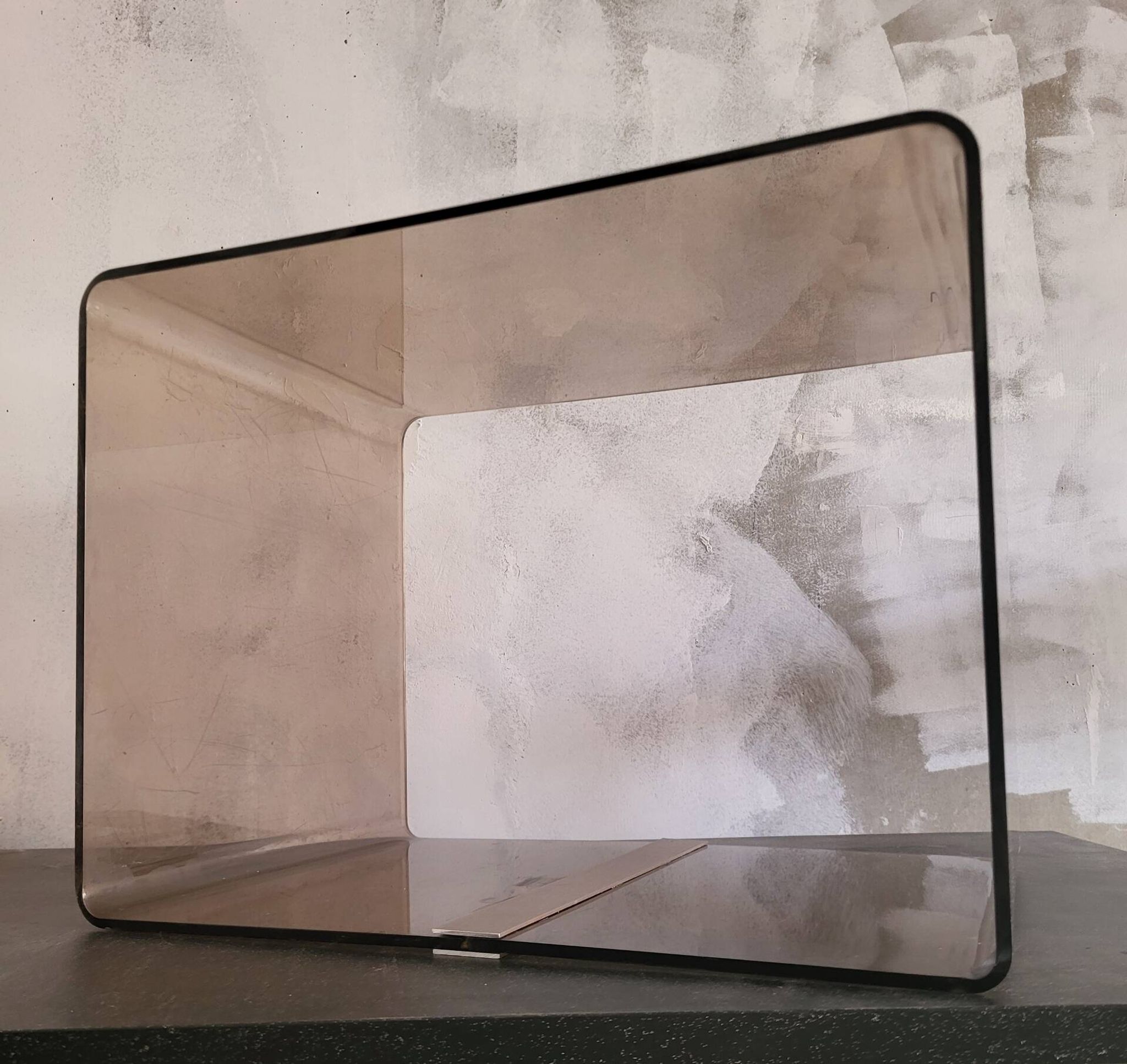 Rectangular piece of furniture or smoked plexiglass coffee table by Michel Dumas.