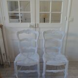 Duo of country-style chairs re-enchanted in pearl gray.