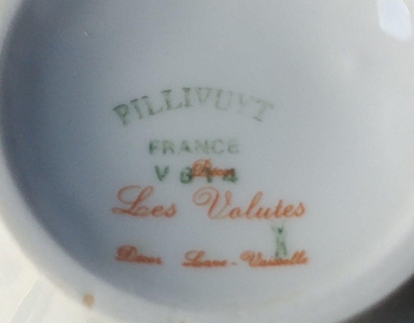 Two cups with herbal tea from the Faiencerie of Pillivuyt