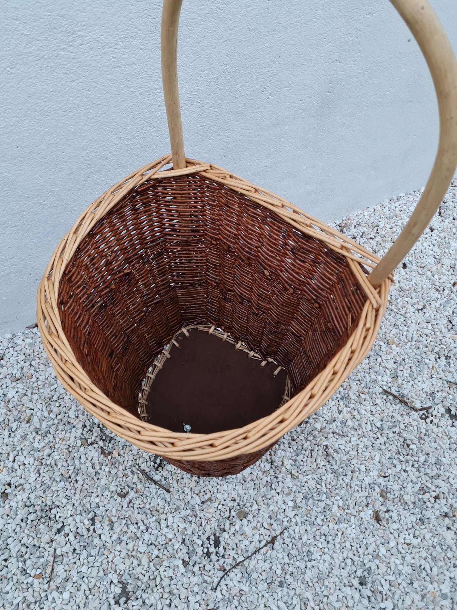 Vintage wicker log basket on vintage wheels