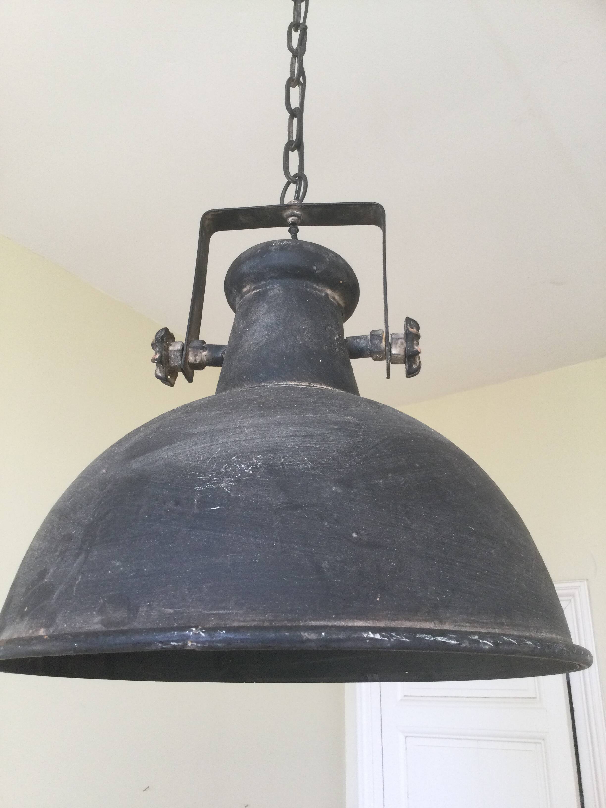 Large round sheet metal pendant light