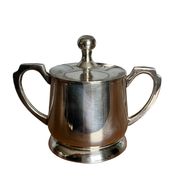 Two small silver-plated metal tea service pots from the 20th century.