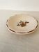 Vintage shallow dish Digoin Sarreguemines with a burgundy rose design.