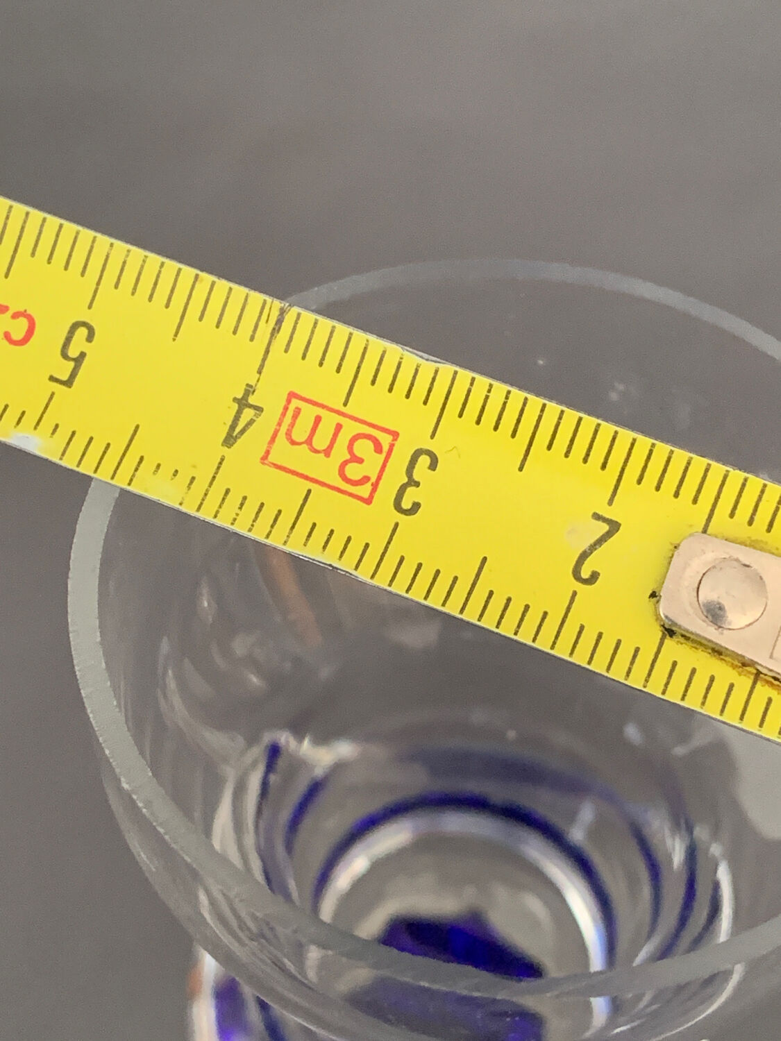 Blue glass candle holder with twisted stem. Candlestick candle