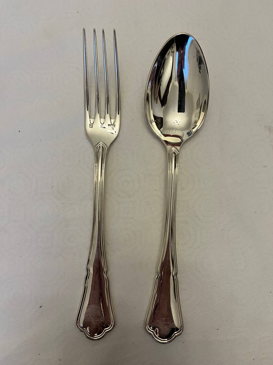 12 silver-plated cutlery sets by Ercuis