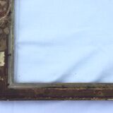 Gilded wooden frame and its glass