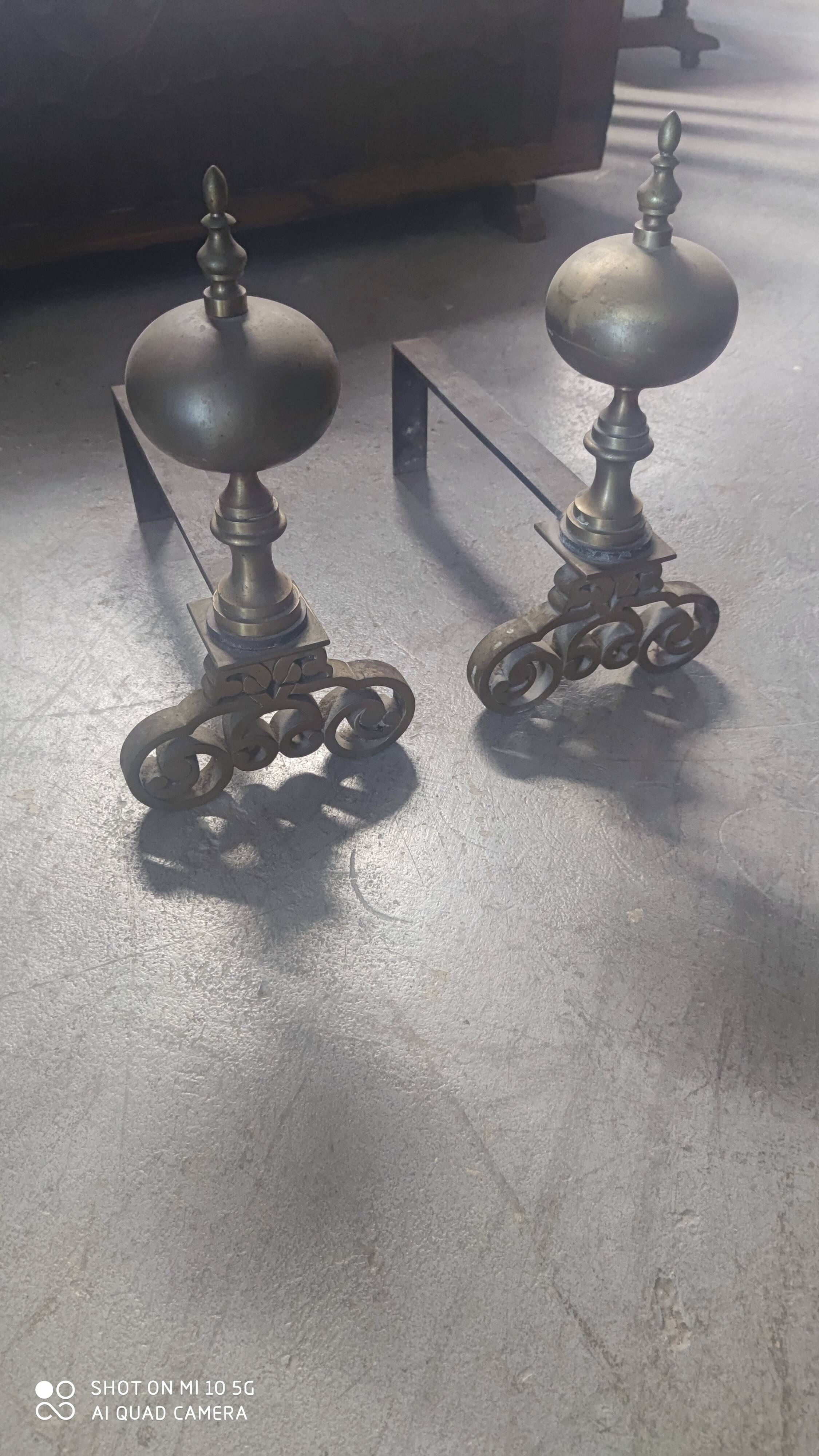 Pair of bronze and steel andirons, 19th century, Holland