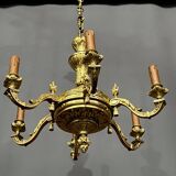 Lustre en bronze de style Louis XIV.