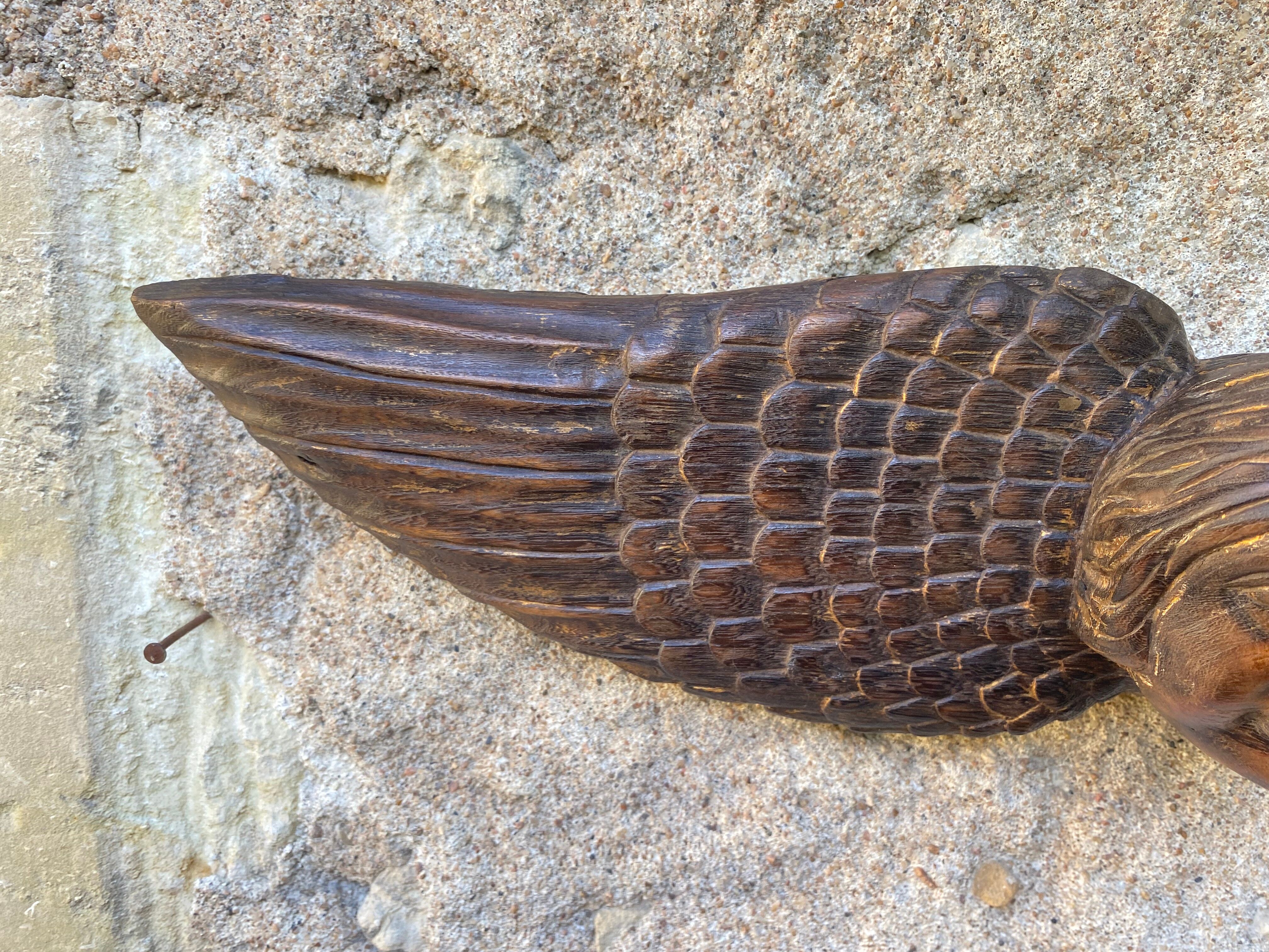 Carved wooden angel head