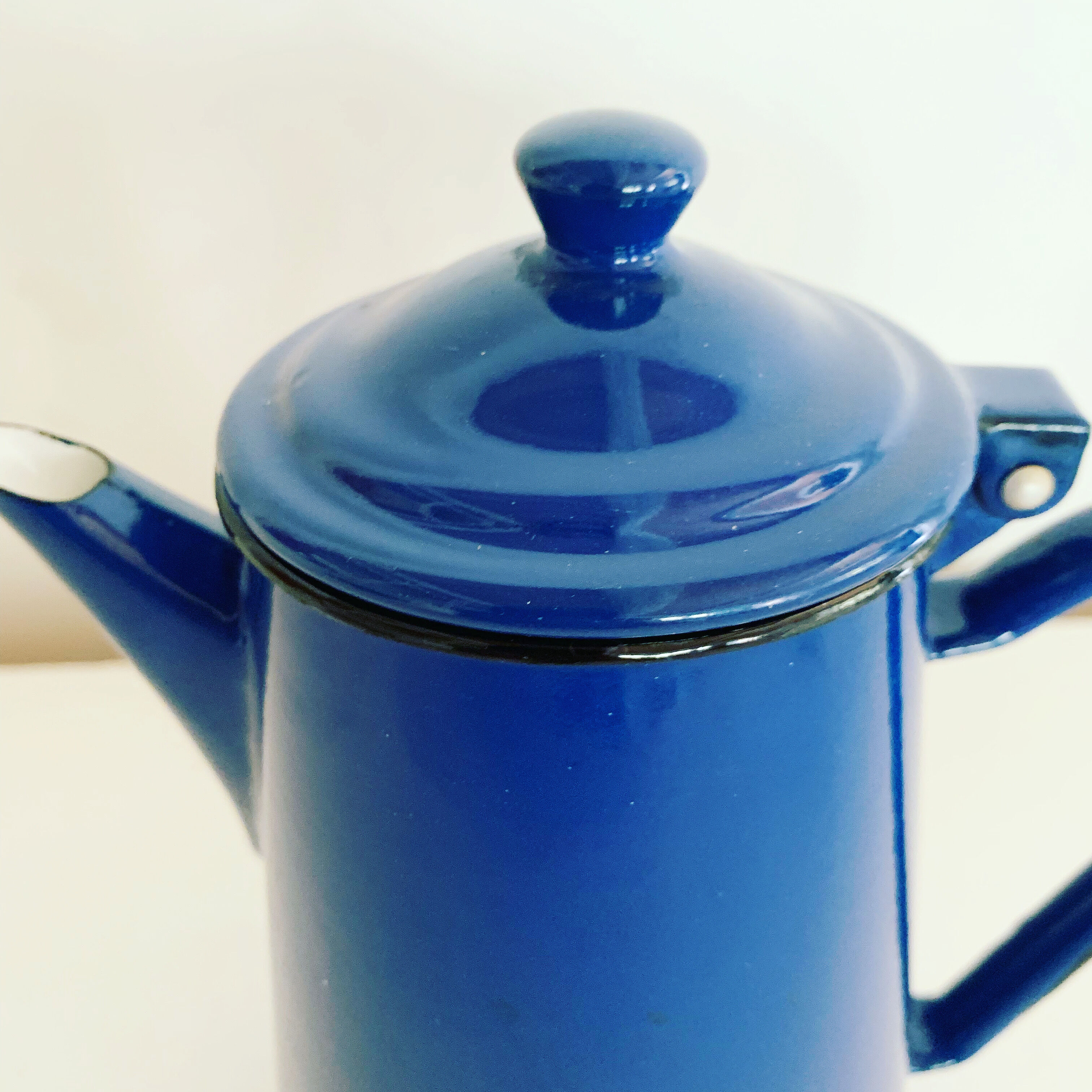 Vintage blue and black enamel coffee pot