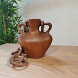 Vase with carved wooden handles