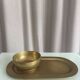 Empty pocket ensemble and bowl in solid brass signed Giò Lanciani.