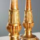 Pair of antique carved and gilded wooden candlesticks, Italy, 19th century.