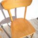 Pair of vintage bistro chairs in golden oak.