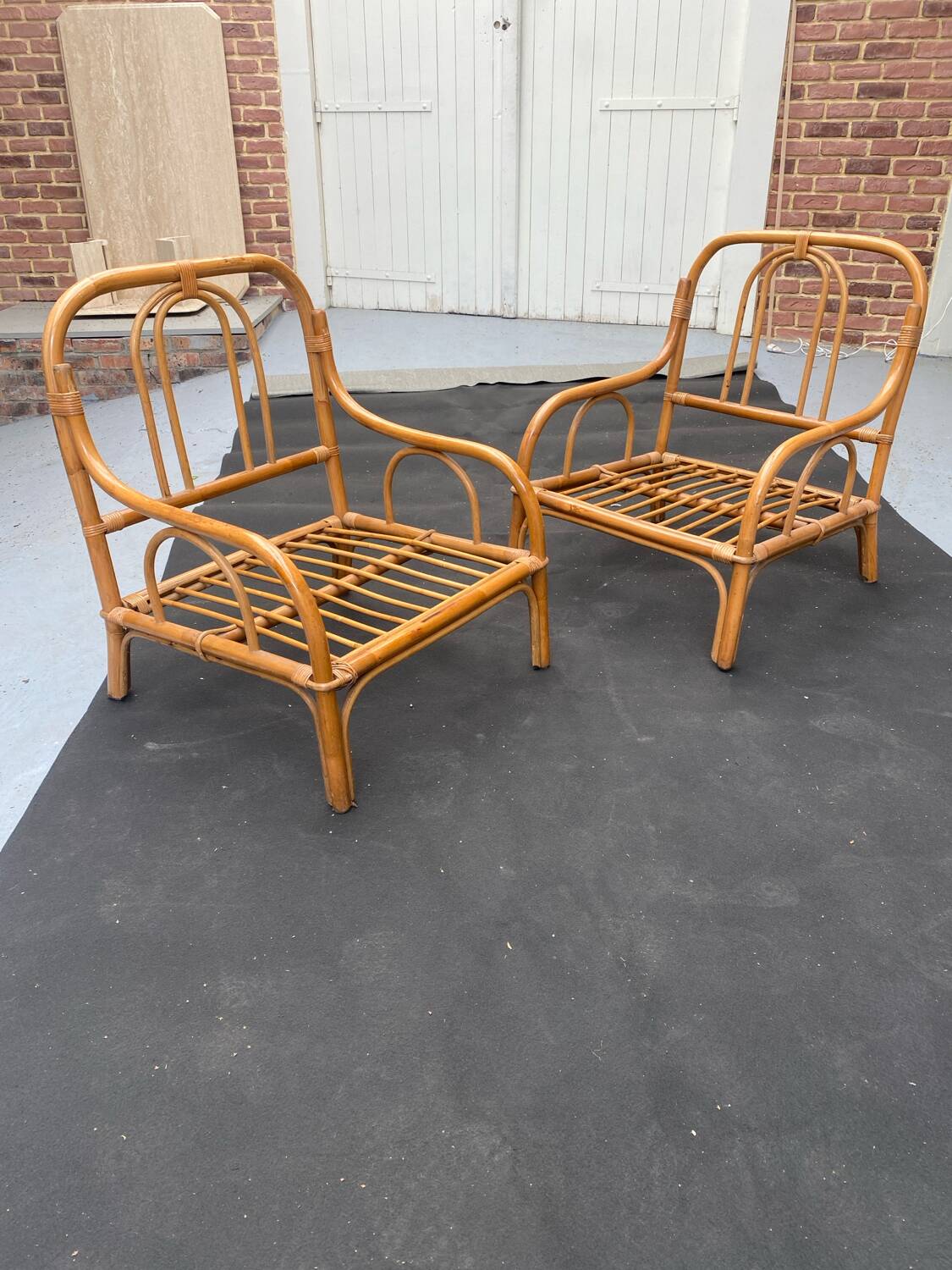 Pair of rattan armchairs
