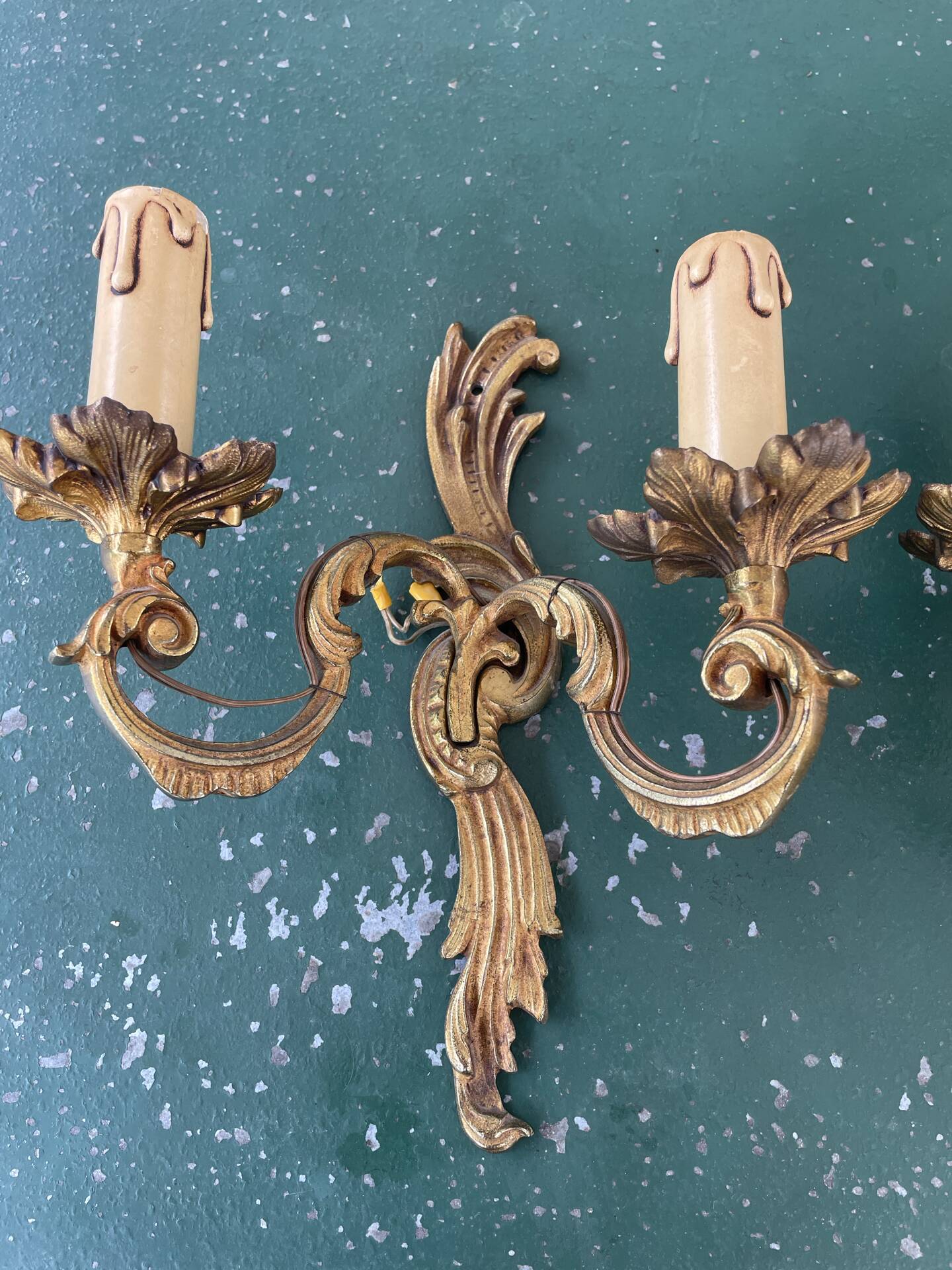 Pair of bronze Art Nouveau wall sconces.